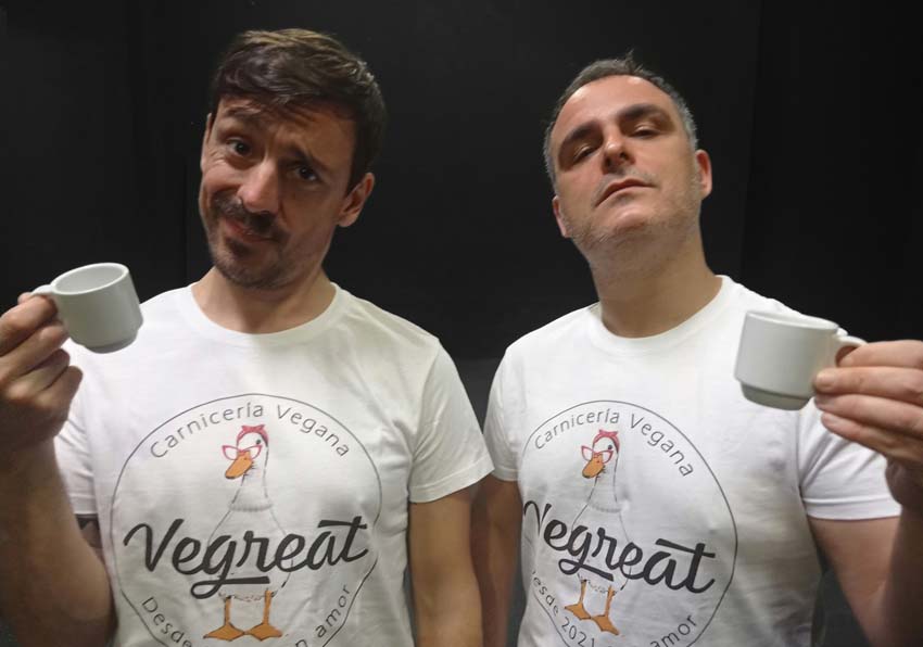 Two men with a cup of coffee